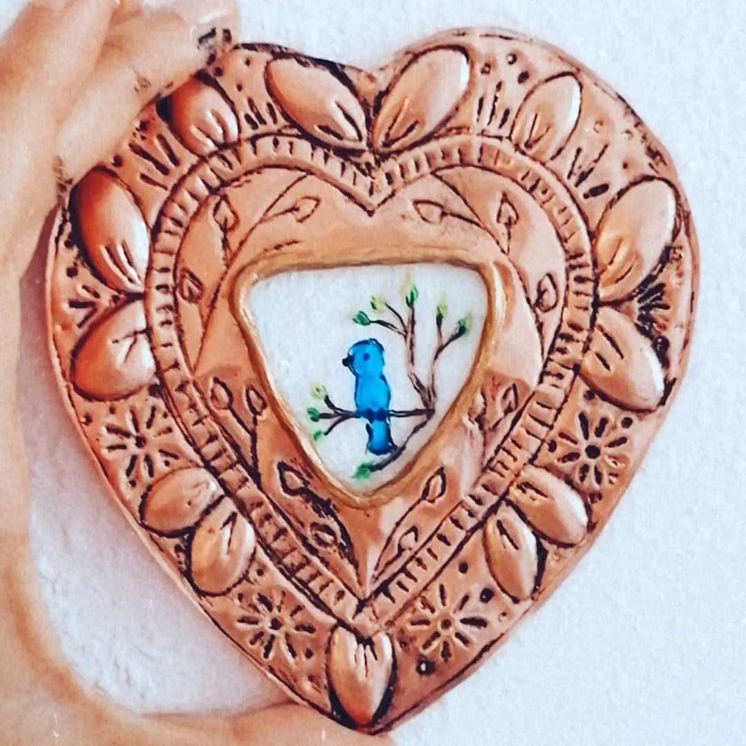 Corazón de cobre con Pájaro Azul